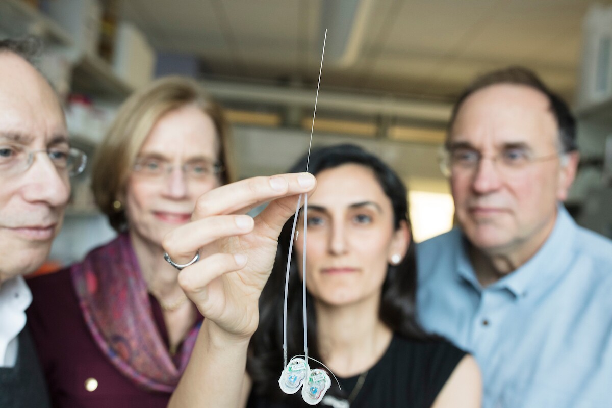 From left to right, the research team includes Institute Professor Robert Langer, Institute Professor Ann Graybiel, Assistant Professor Canan Dagdeviren, and Professor Michael Cima
