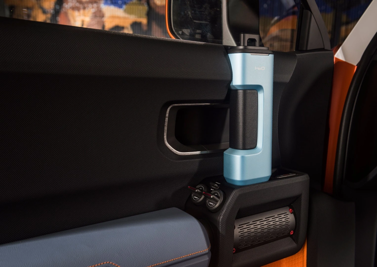 Removable water bottles integrated into the door handles of the FT-4X Concept fall into our "probably gonna get lost" category