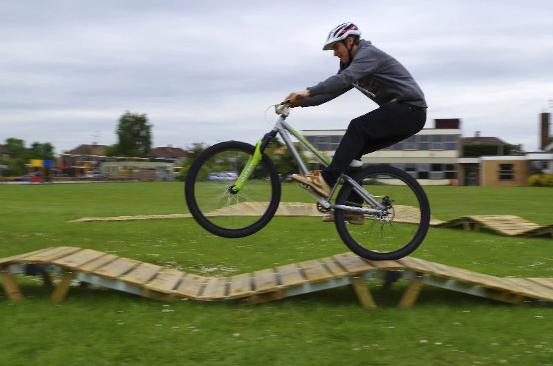 The system was inspired by a network of roller-coaster-like elevated wooden mountain bike trails, for which the Canadian city of Vancouver's North Shore area is known