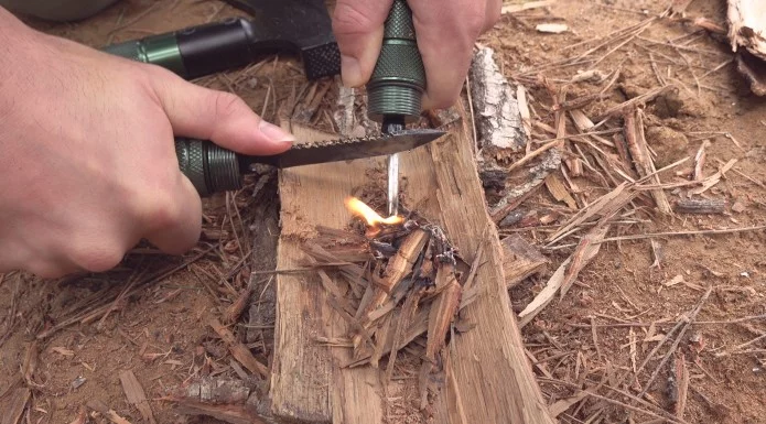 The emergency whistle includes an integrated fires tarter and fits into the lower handle for better grip