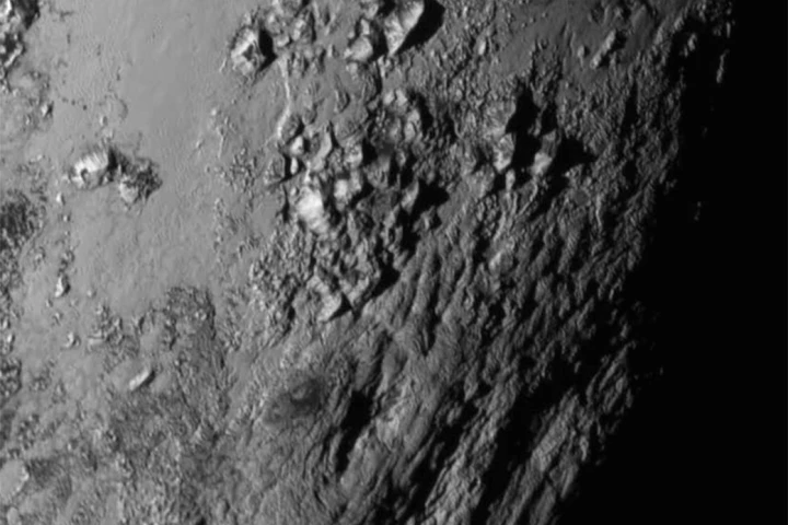 High resolution image showing mountains on the surface of Pluto