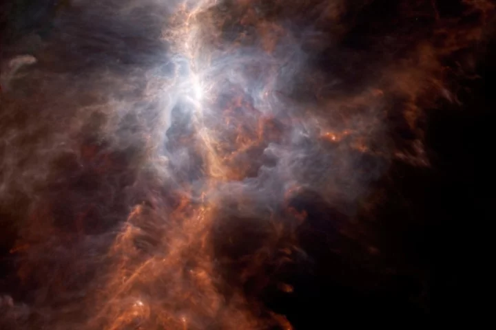 The dusty side of the Sword of Orion is illuminated in this infrared image from the European Space Agency's Hershel Space Observatory