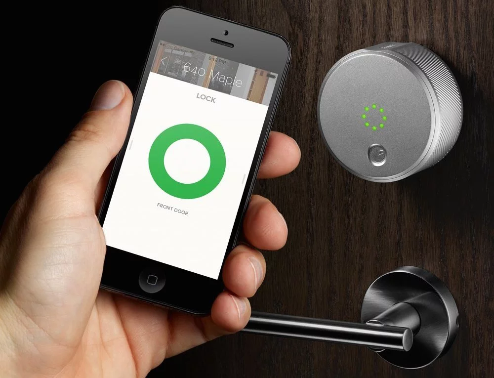 The August Smart Lock provides secure entry with a smartphone, and can be configured with multiple user accounts and temporary guest permissions