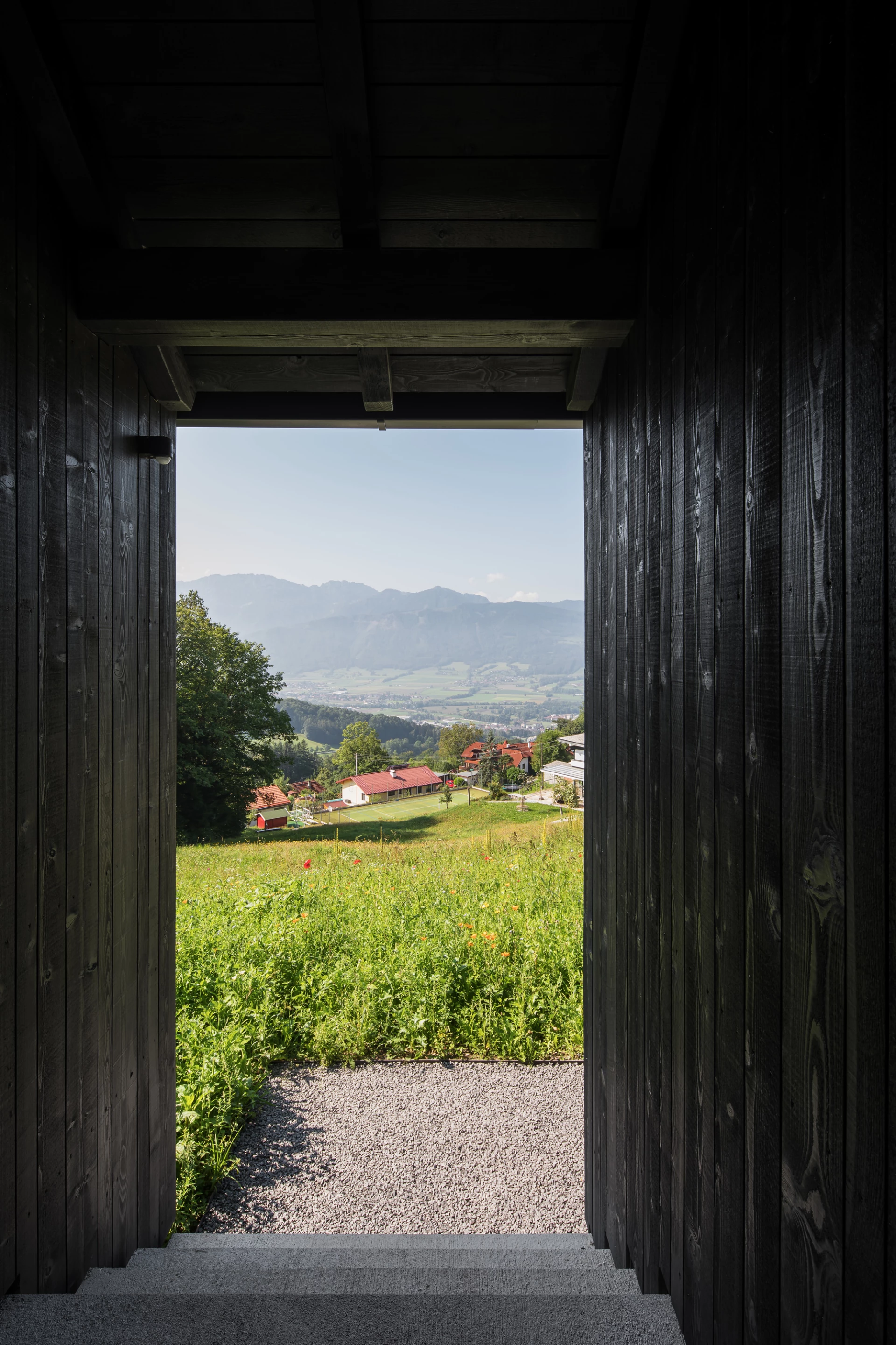 The Mountain House, an elegant rectangular-shaped home built into the slopes of the Austrian alps