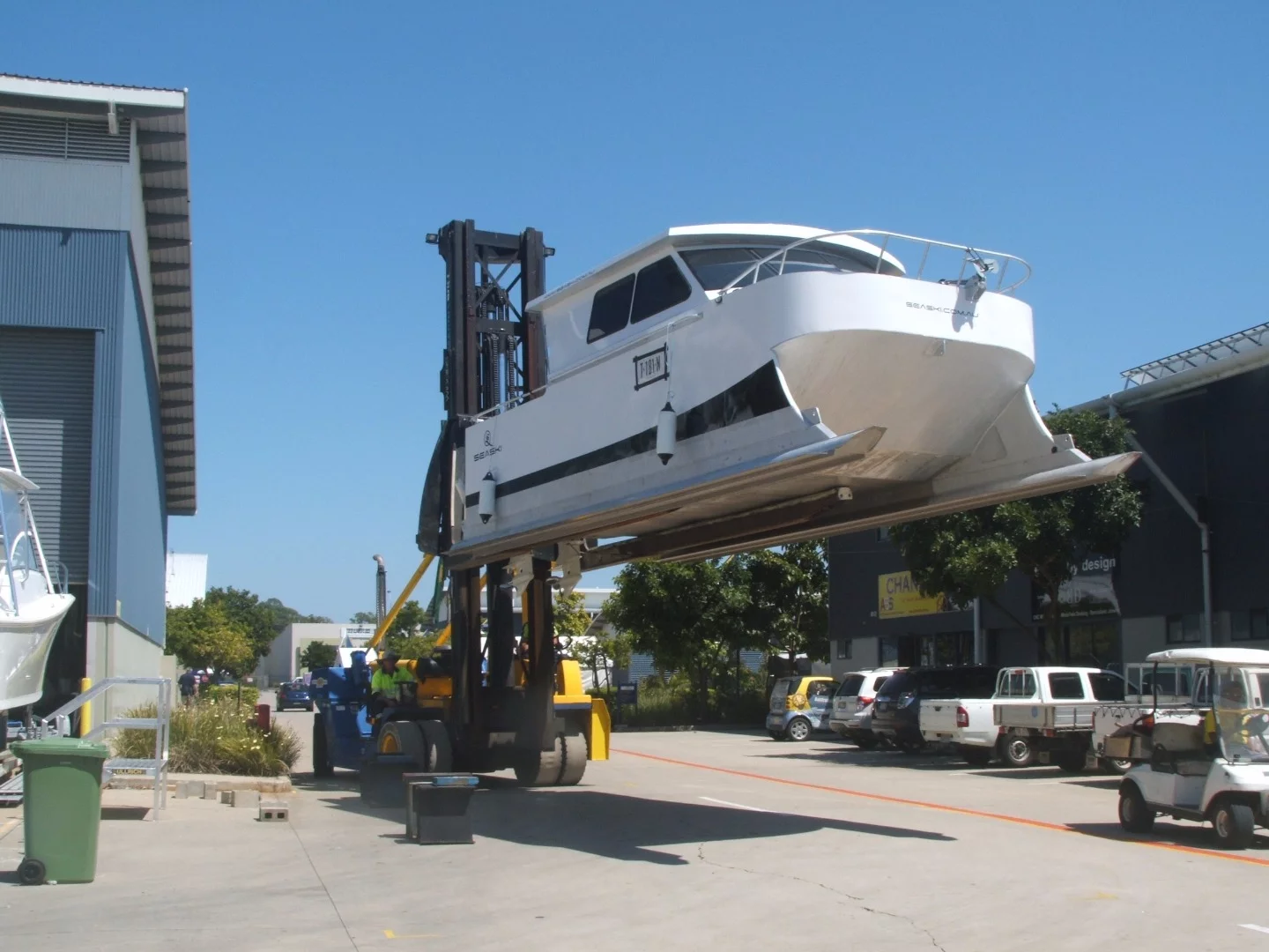 A fork lift manoeuvering the Sea Ski into position for its first public showing at the Gold Coast International Marine Expo, Australia