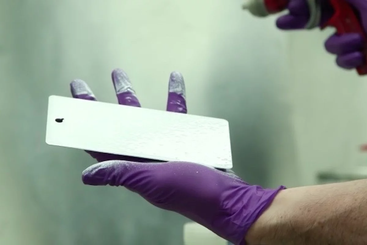 The glass paint is applied to a test surface