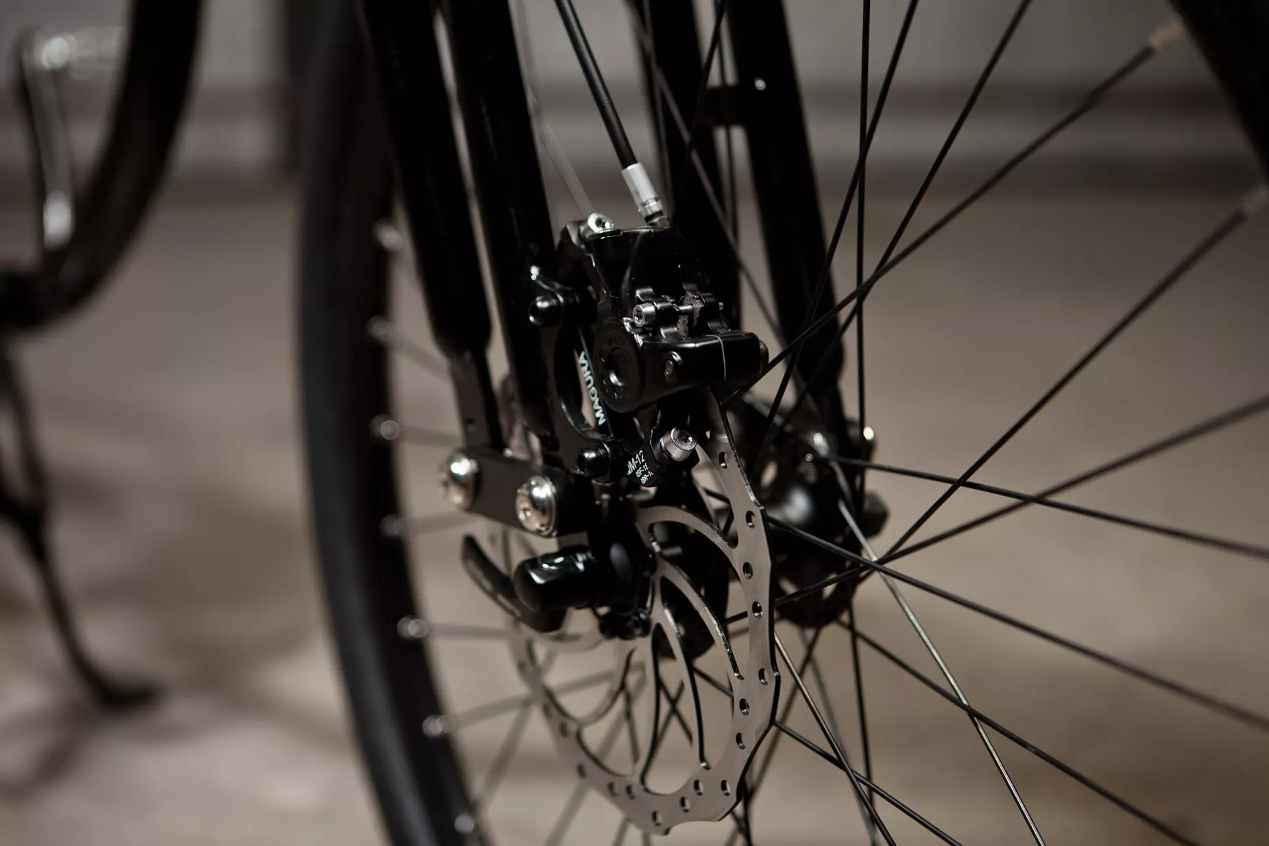 The e-bike's top speeds vary from 20 mph in the base model to 40 mph in the Bespoke series, and mileage ranges from 22 to 38 miles