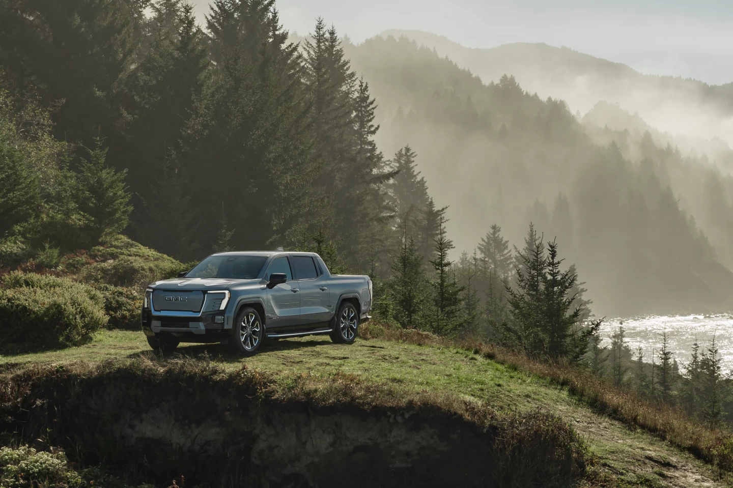 With an extra 40 miles of range, plus 800-V fast-charging at up to 350 kW, the Sierra EV Denali Edition 1 pickup is more ready than ever to venture off the beaten path and into the mist