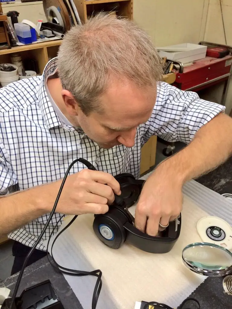 Neil Welch making some final adjustments to the Glyph prototype ahead of a CES debut