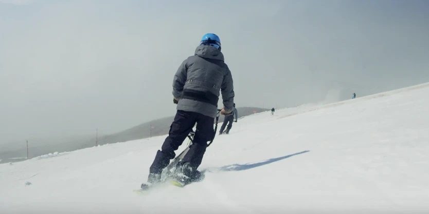 A Snogo rider hits the mountain