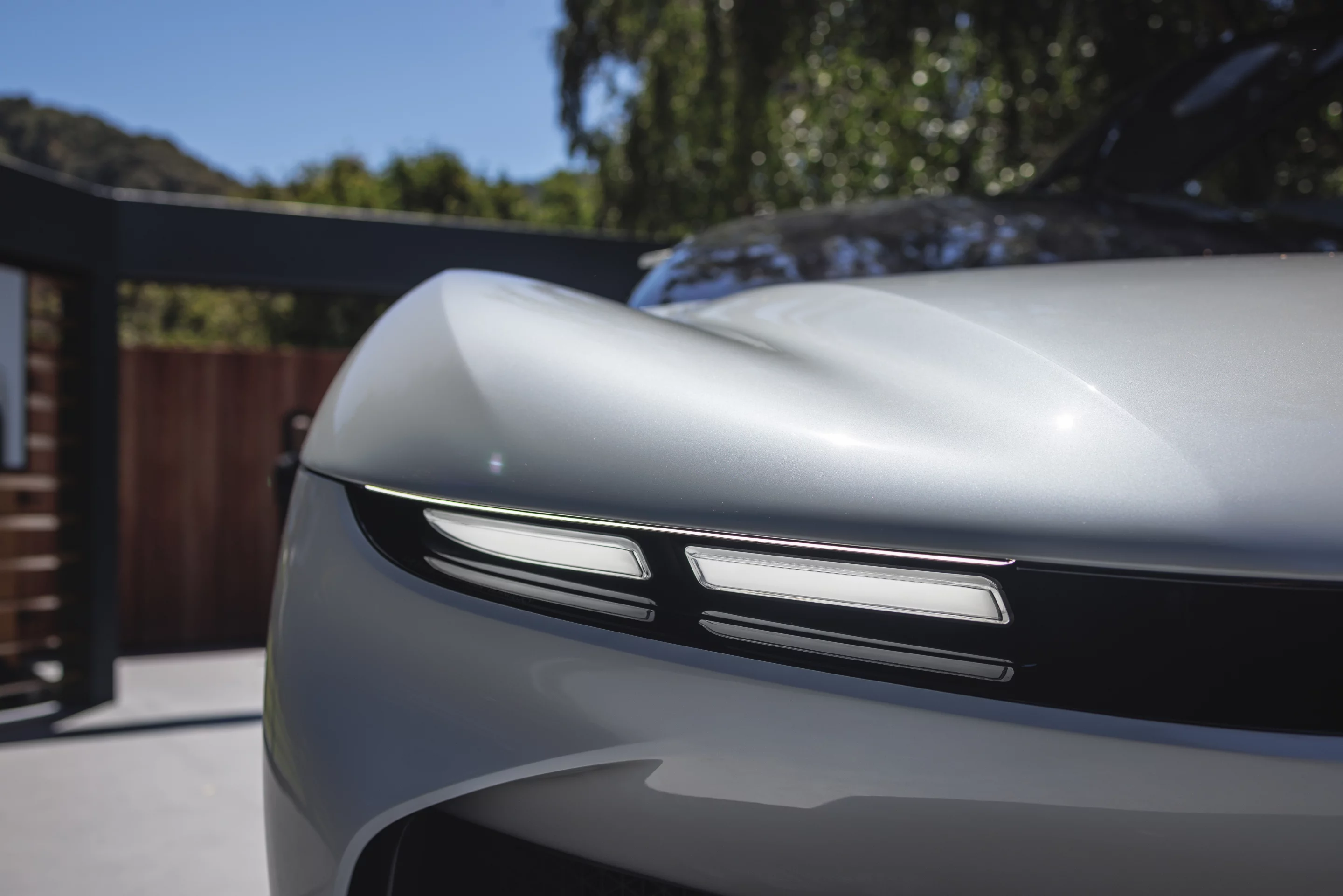The "L.E.S.S." nano-fiber daytime running lamps look like ultra-thin, freshly plucked eyebrows over the headlights