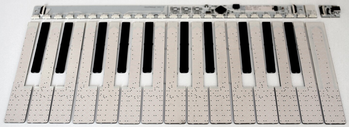 The TouchKeys black and white sensor strips and controller board