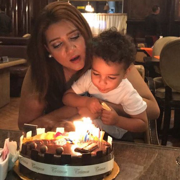 The currently imprisoned Egyptian mother, Amal Fathy with her child
