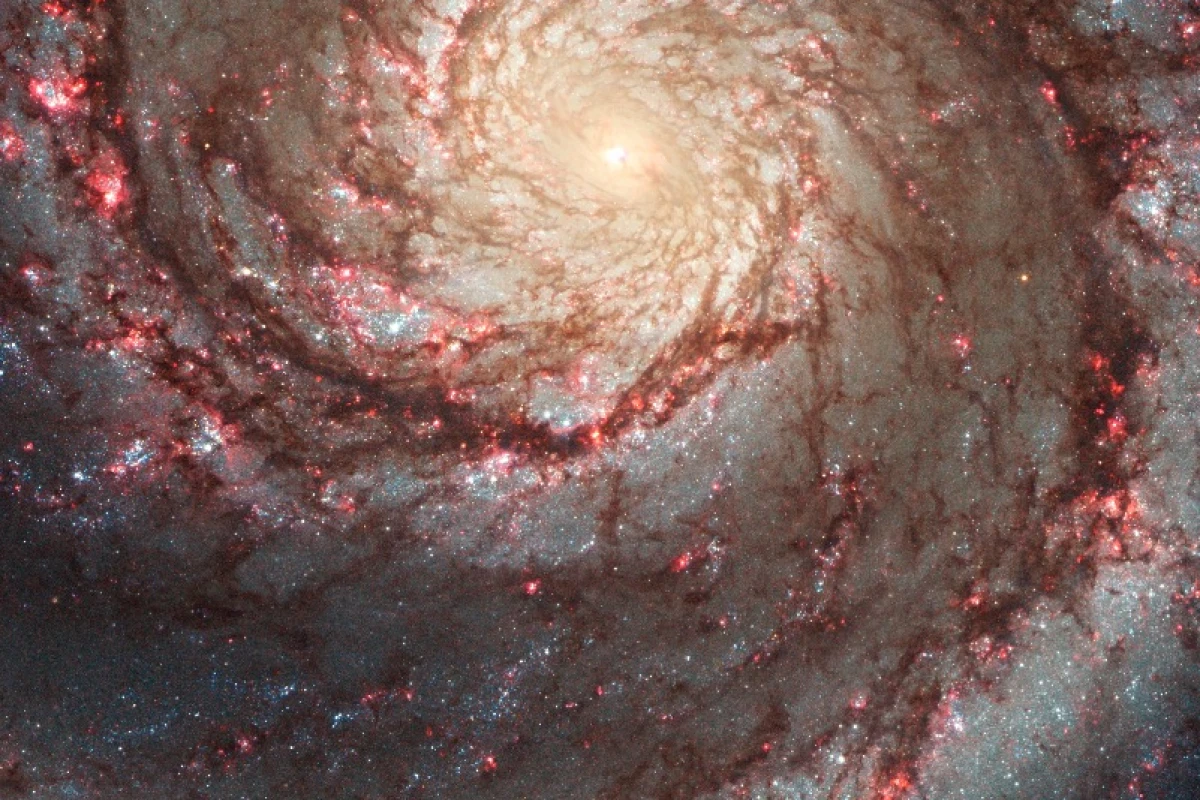This image by NASA's Hubble Space Telescope shows a face-on view of the spiral galaxy M51, dubbed the Whirlpool Galaxy