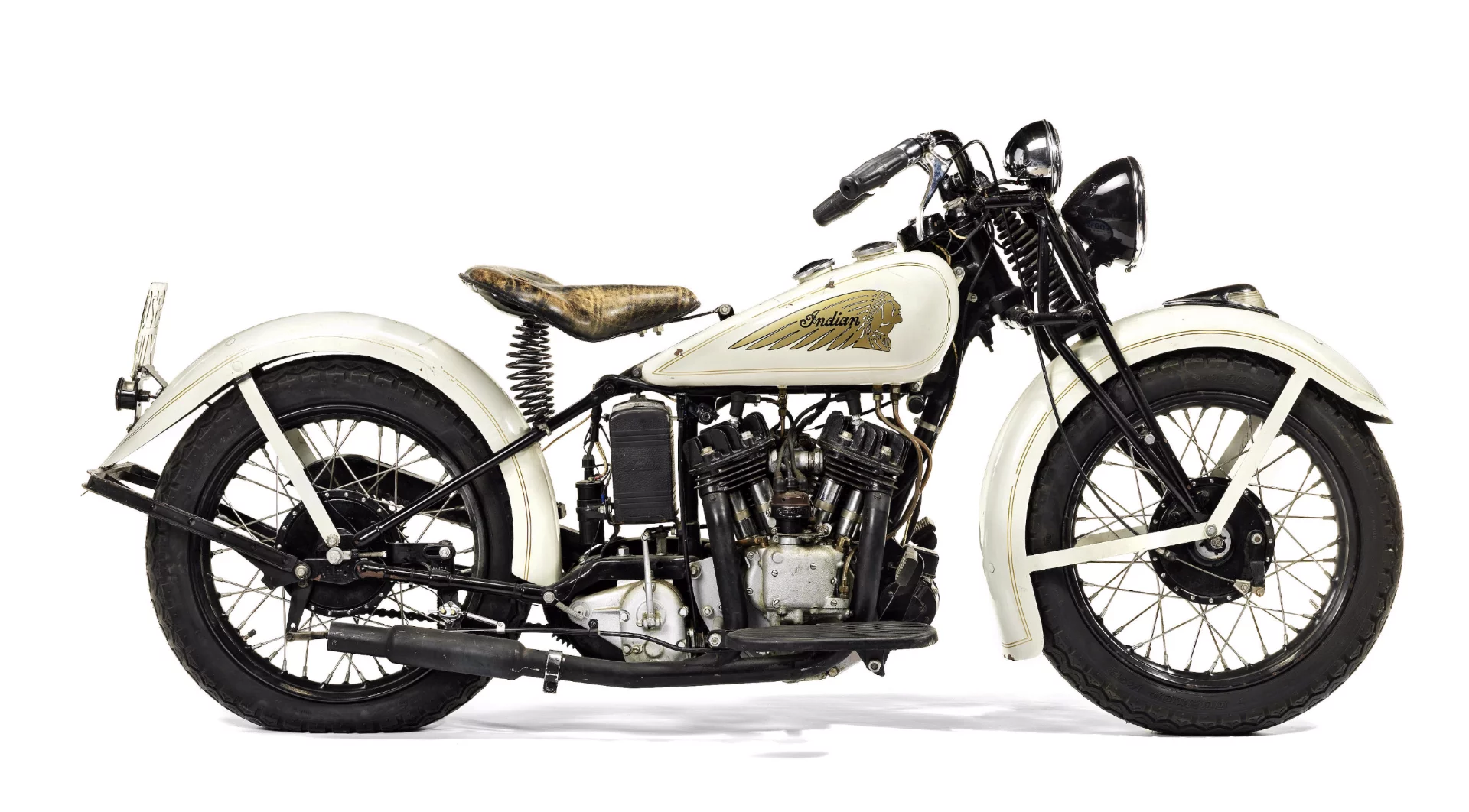 This former Steve McQueen steed, a 1934 Indian 750cc Sport Scout, was purchased by the current vendor at Bonhams' McQueen Sale in San Francisco in November 2006 for US$177,500. It sold at Stafford for £59,740 (US$92,236), which is an $80,000 discount. We've written about McQueen's "Midas touch" many times and the king of cool's brand values are pure gold. He is still one of the world's highest earning celebrities a third of a century after his death, more than a dozen of his former motorcycles are in the 250 most valuable motorcycles in the world, and earlier this year,Steve's Cyclone became the most expensive motorcycle ever to sell at auction. Well bought!