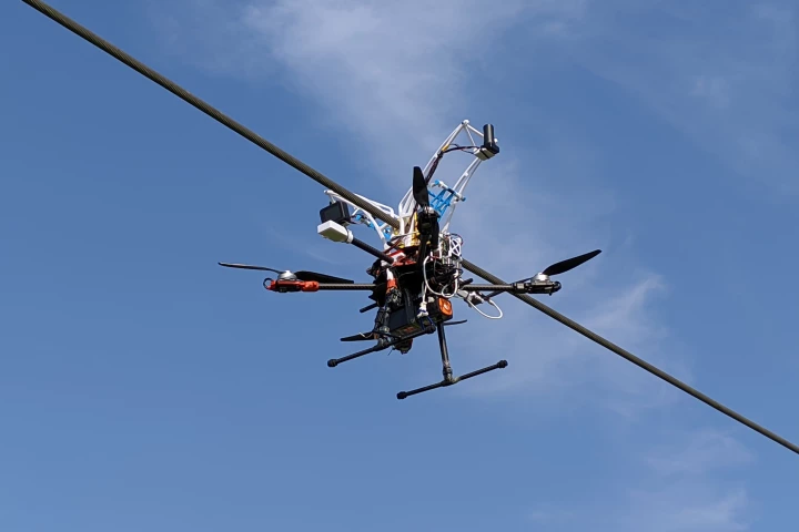 The drone is intended to draw power from lines that it's already been tasked with inspecting