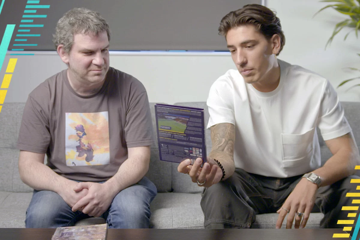 Sports Interactive director Miles Jacobson and Hector Bellerin with the company's recyclable game packaging