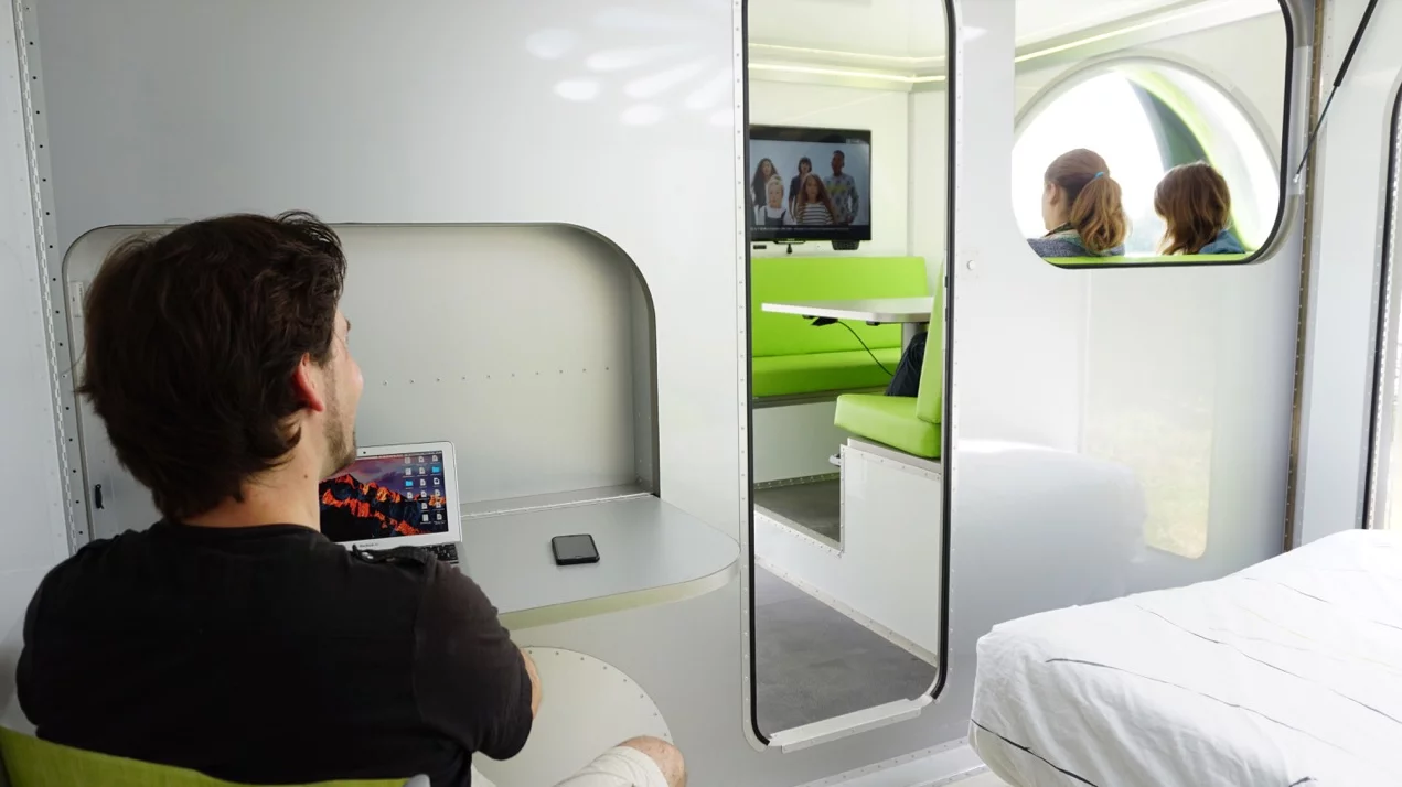 The master bedroom includes a drop-down desktop, adding some appeal for digital nomads