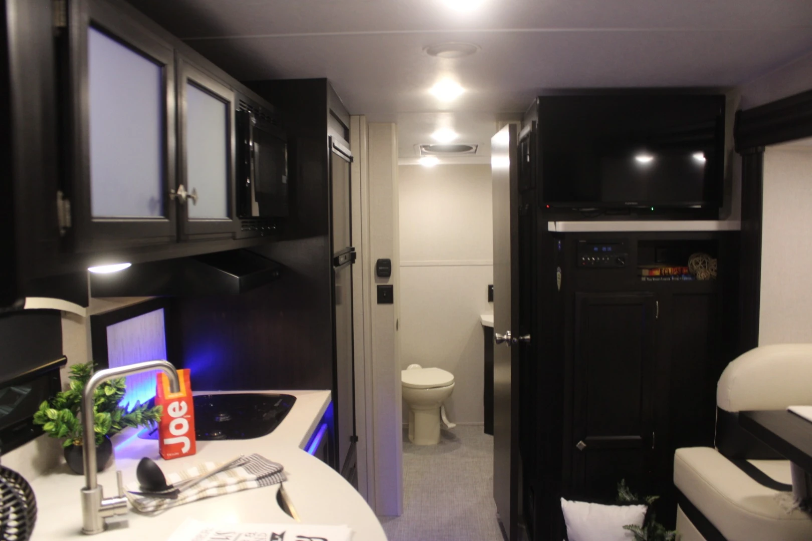 The interior includes a TV