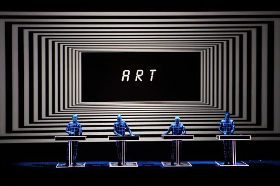 Archival images of a performance by the band Kraftwerk