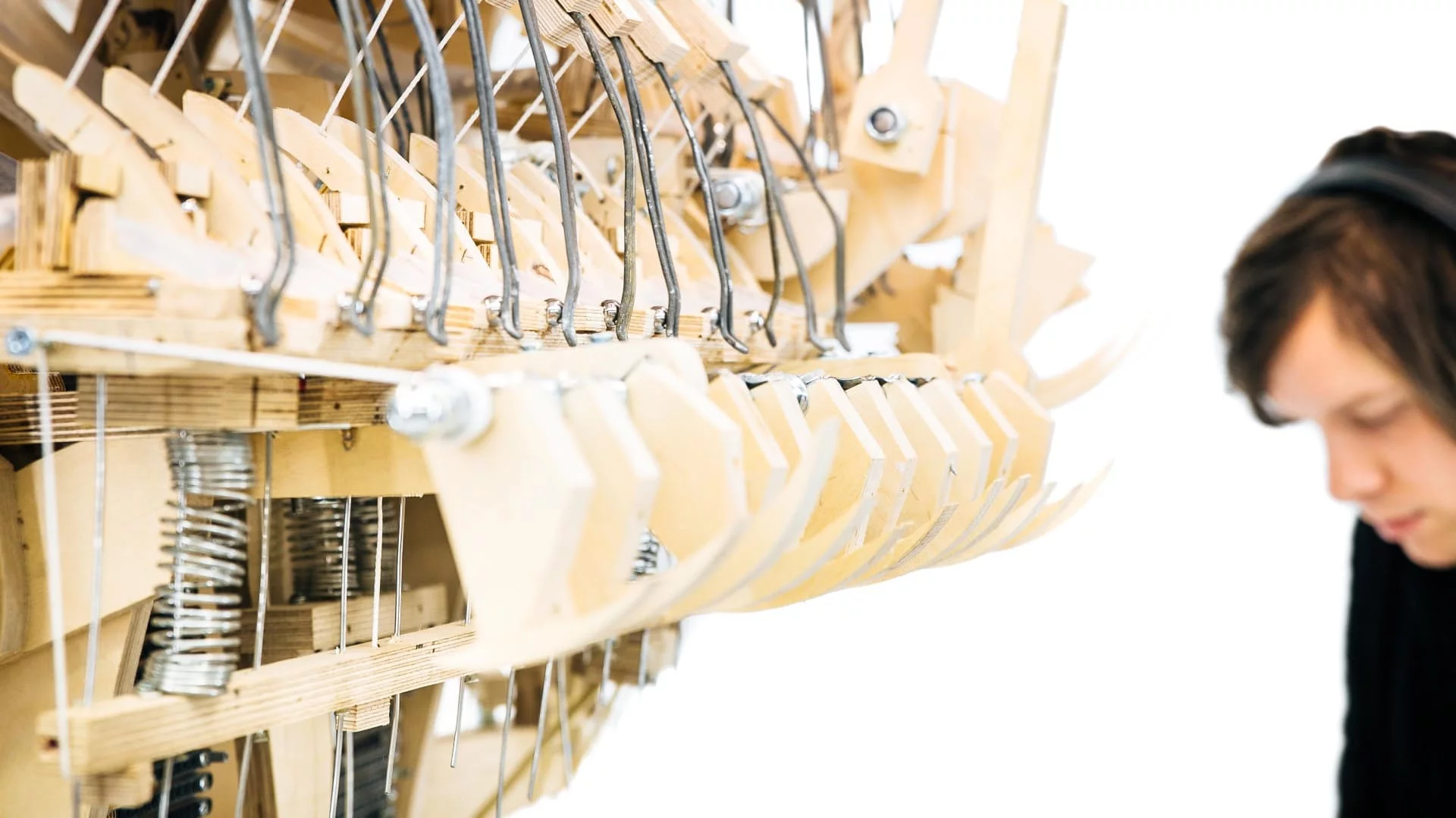 The printing press-like contraption was made from birch ply and makes use of 2,000 metal balls to play a tune