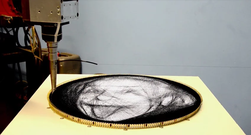 The string art robot completes an image