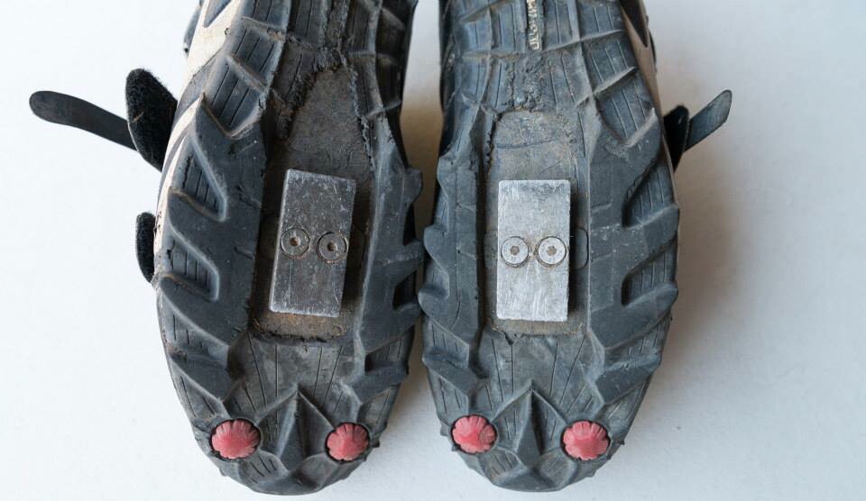 The magnetic cleats, attached to the rider's shoes