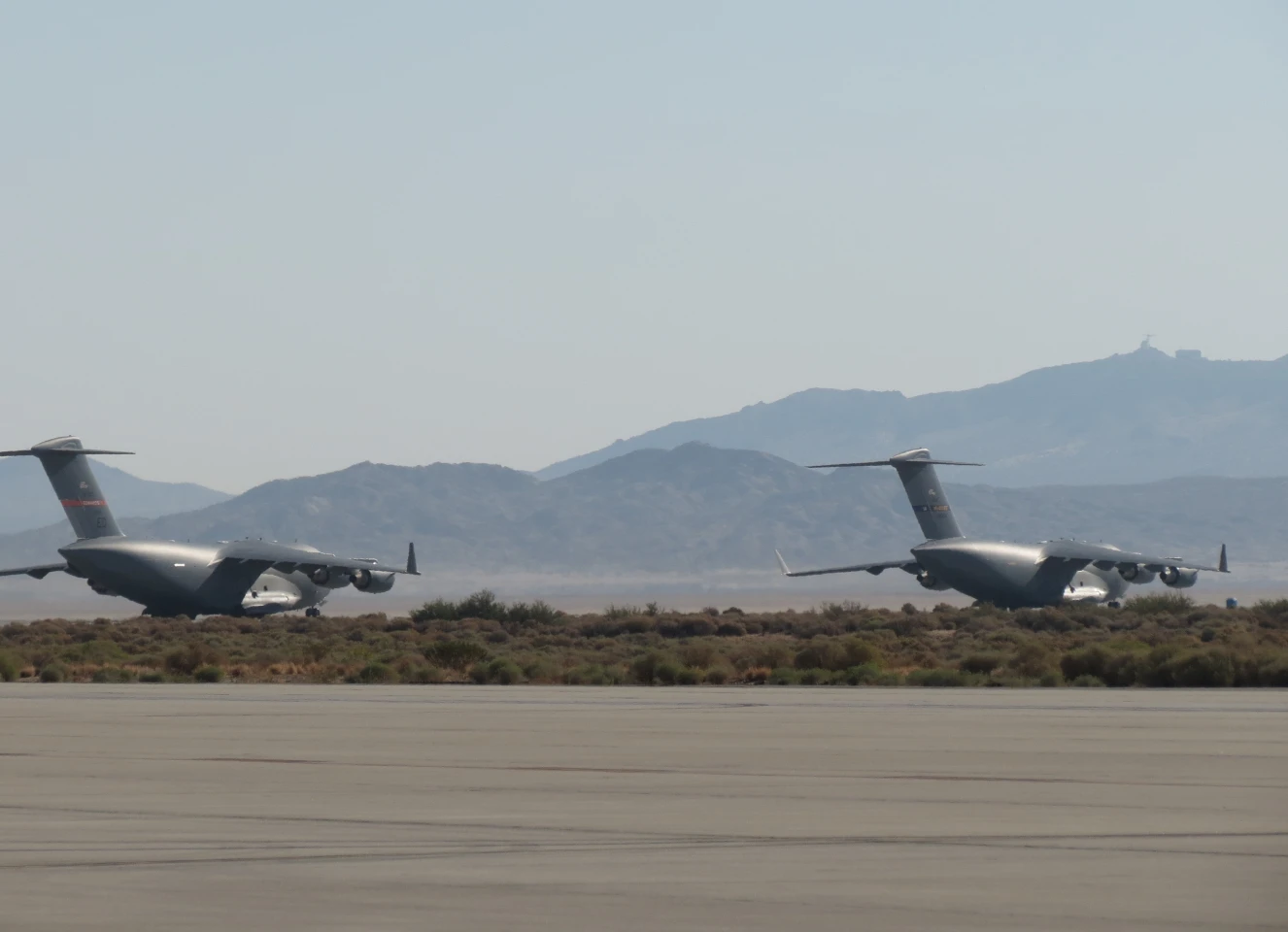 Tw0 C-17 cargo planes used in the $AVE vortex surfing tests (Image: US Air Force)