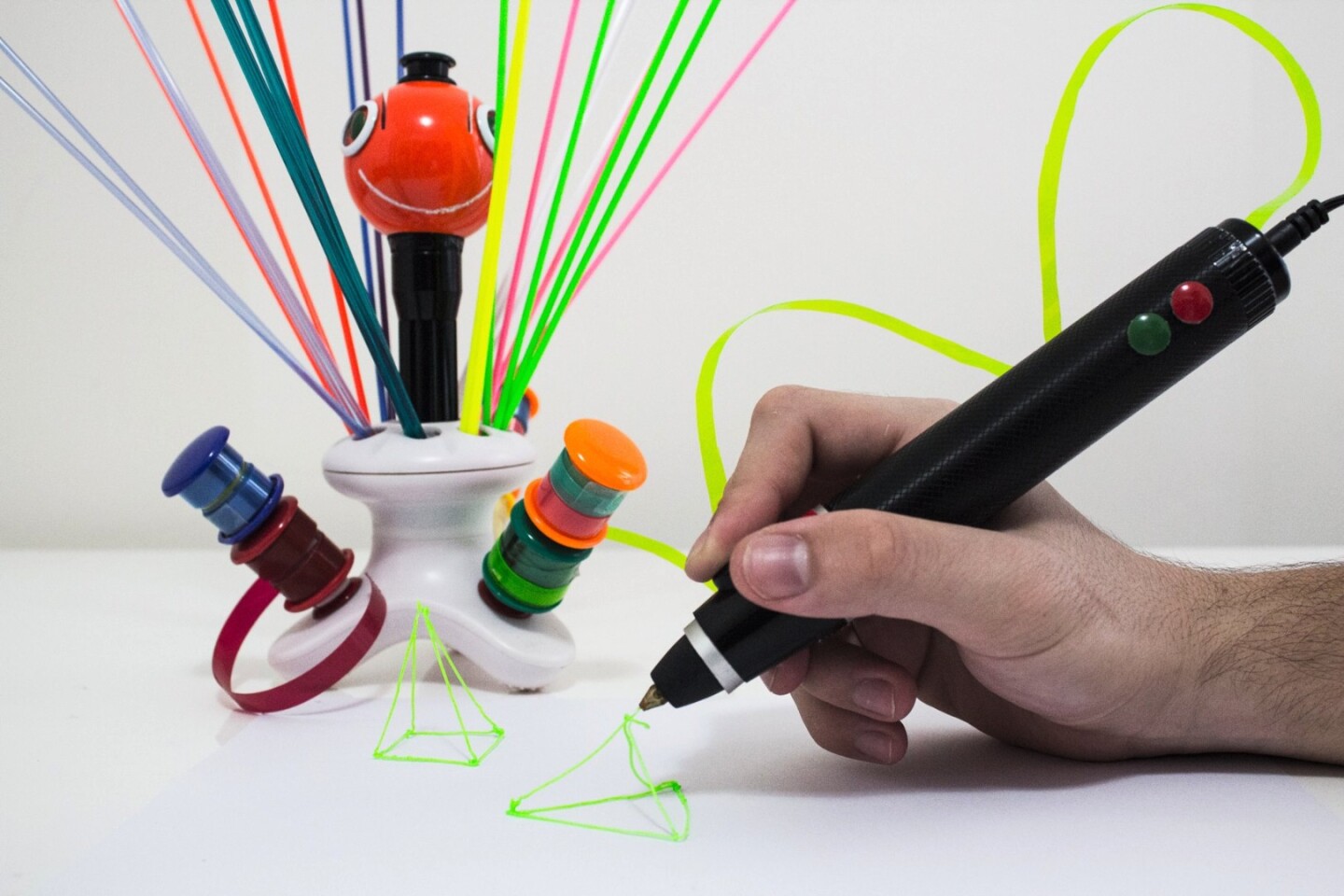 The renegade pen in front with the bottle-shredding ChupaCut in the background