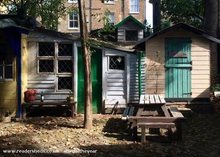 The village is a cluster of sheds that includes mini theater/house, a pub made mostly from old harmoniums, and more