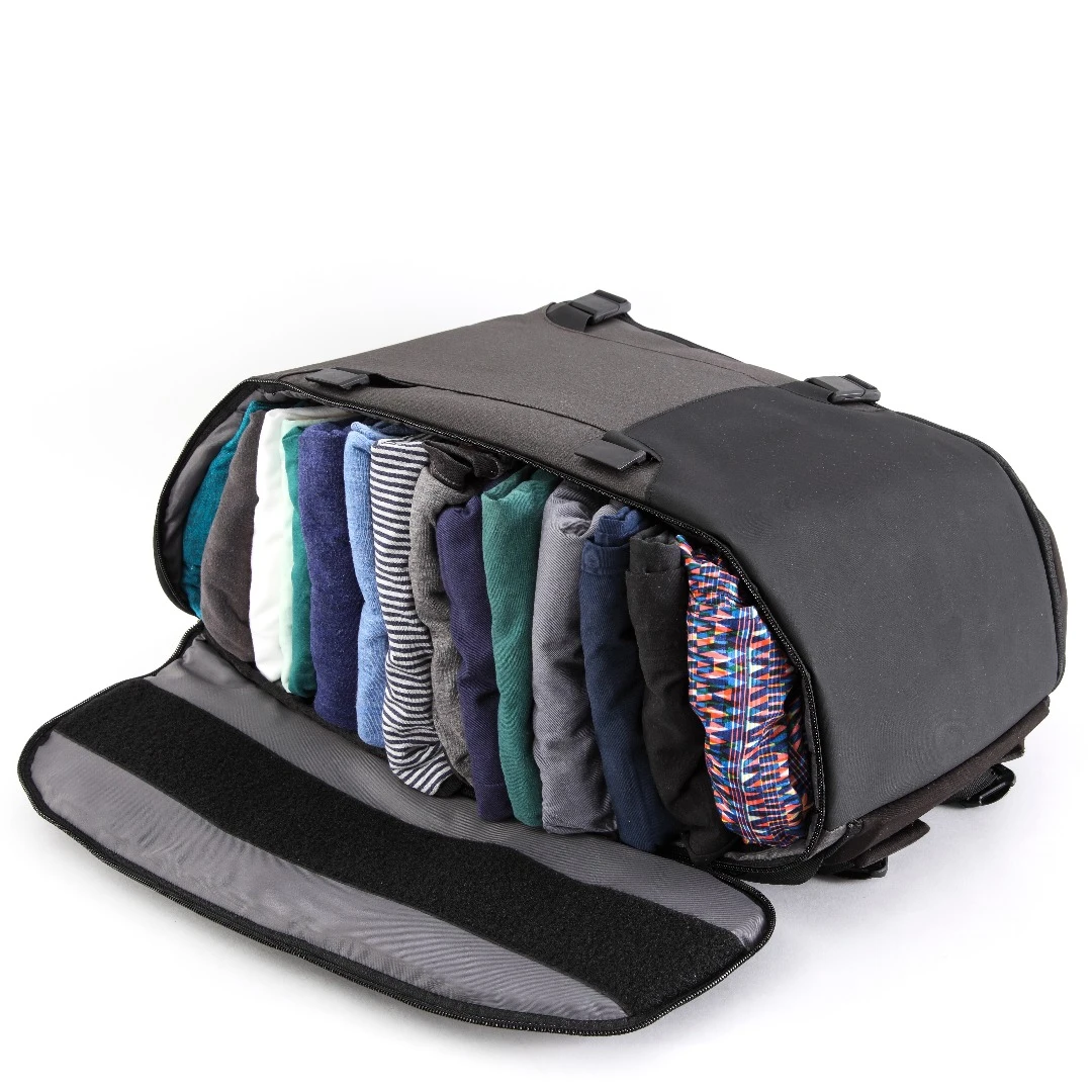 The GoBag backpack has a main zipper that goes all the way around, so you can open it from the top or from either side