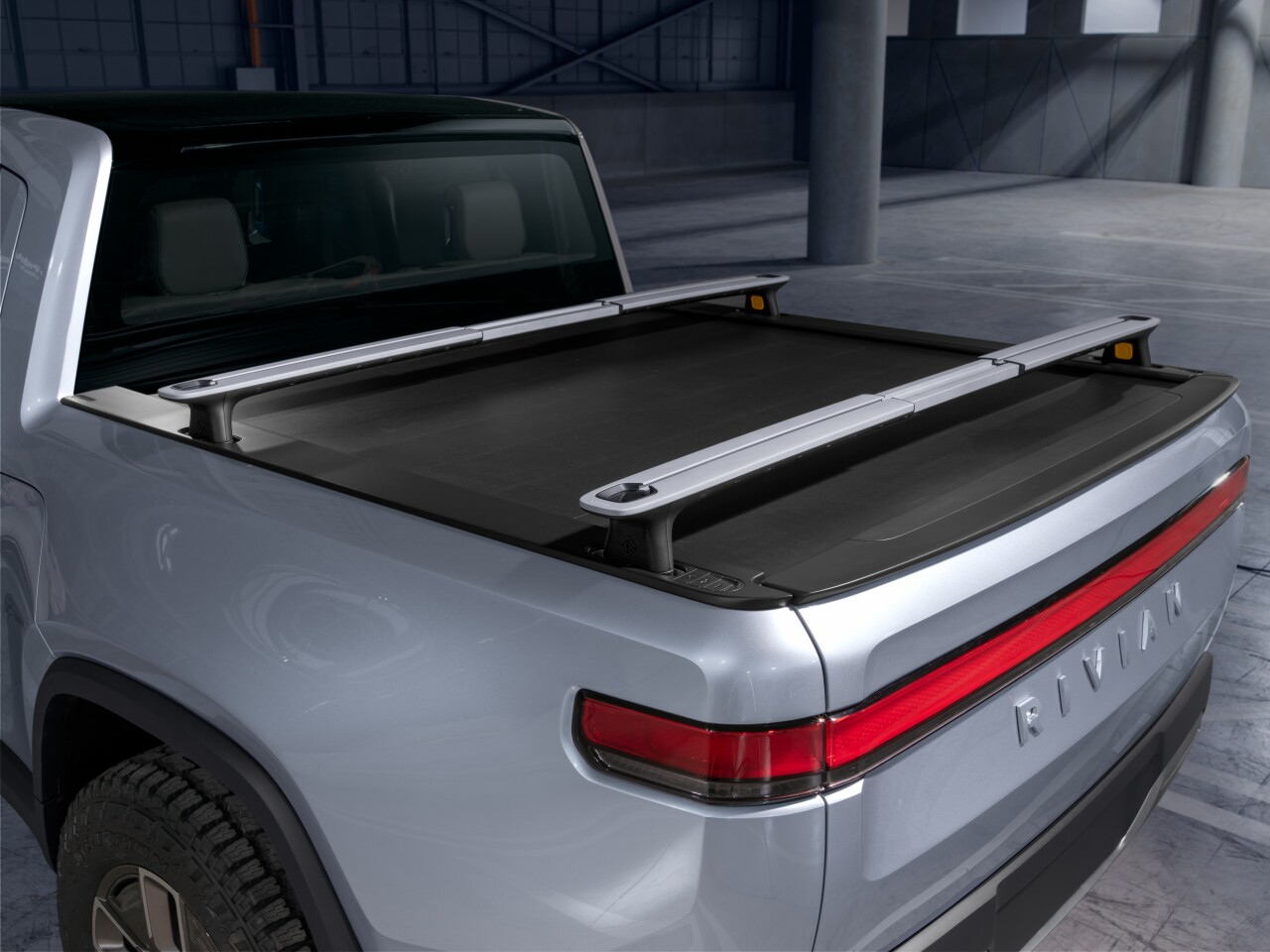 Rivian has developed a telescoping rack for use on/in the bed or roof