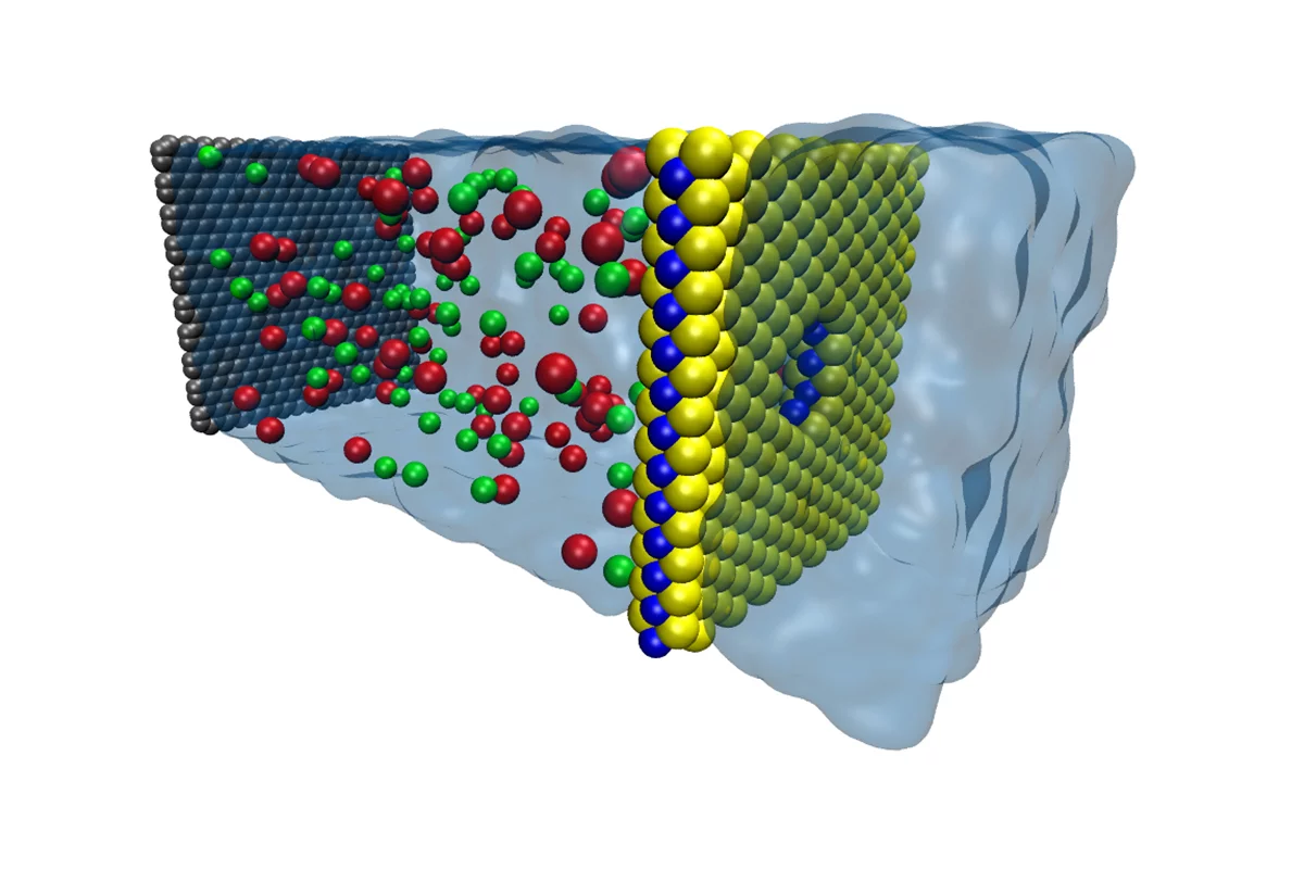 Schematic of a MoS2 sheet (molybdenum in blue and sulfur in yellow) filtering salt water on the left to leave fresh water on the right