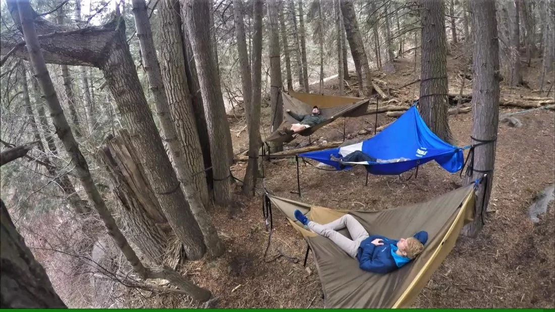 The Treble Hammock 2.0 has a gear storage pocket near the user's head with six gear loops
