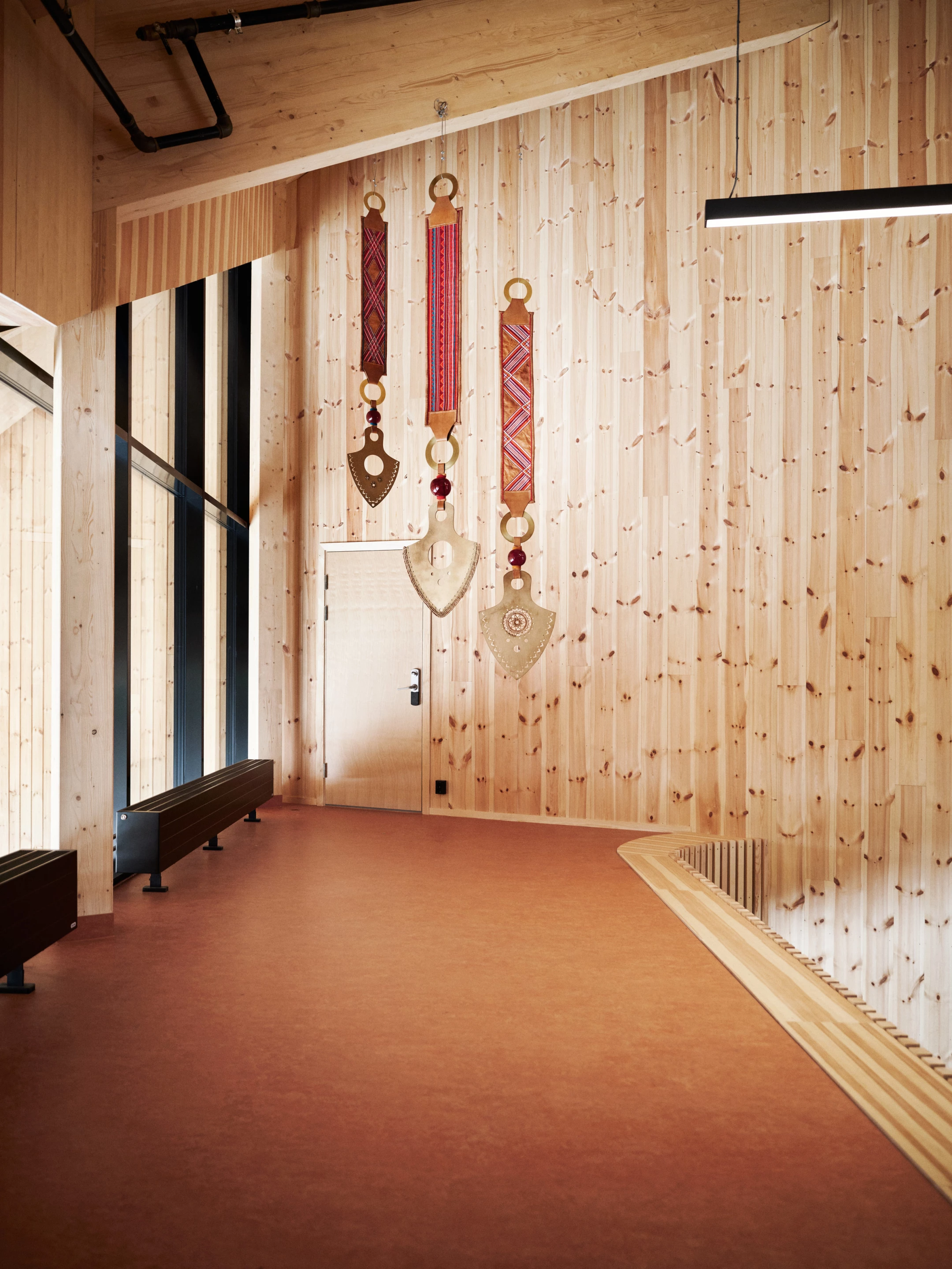 Čoarvemátta's interior includes traditional Sami artwork