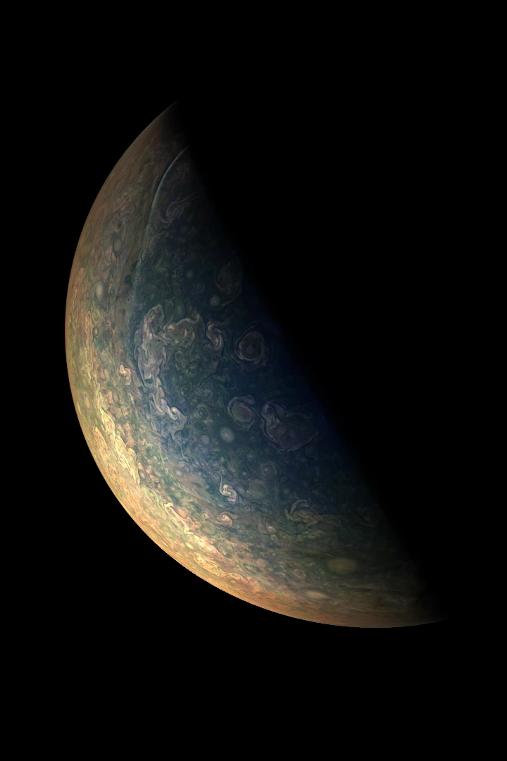 This image is reconstructed from JunoCam data taken during Juno's Perijove-09. It is approximately illumination-adjusted, and enhanced by a gamma stretch to the 4th power of radiometric data