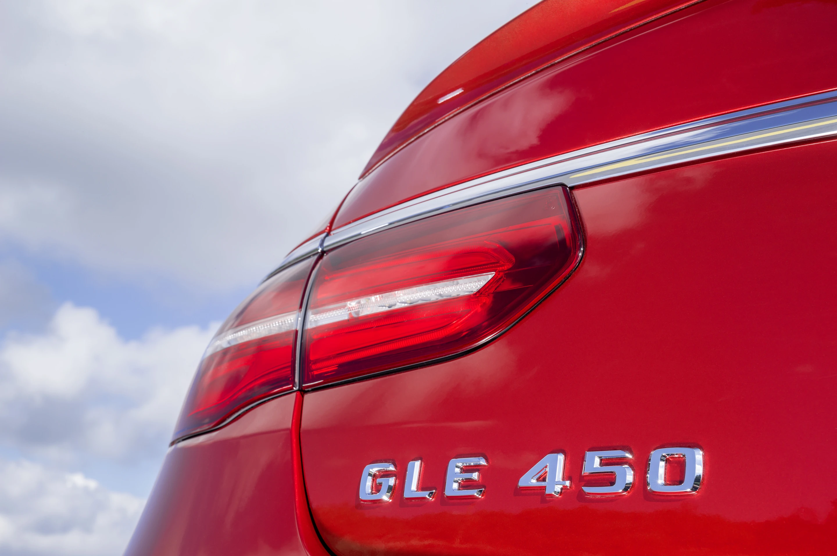Wide, slim rear taillights and strong haunches make the car look wide and low on the road