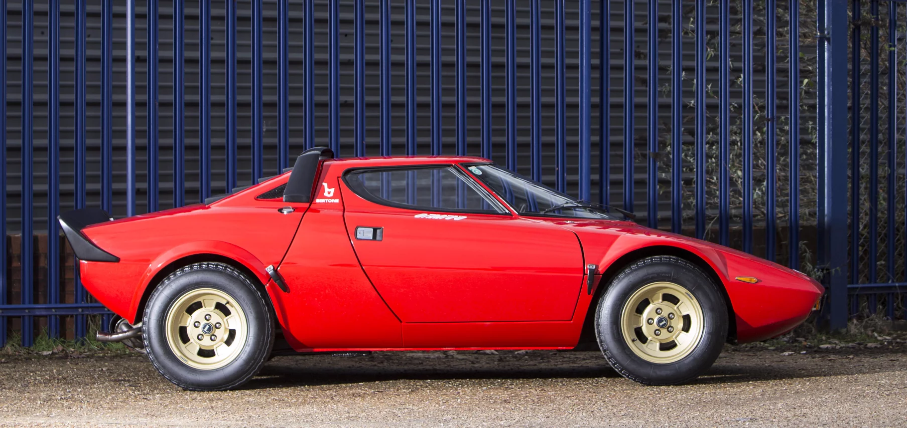 The 1977 Lancia Stratos Coupe is essentially a purpose built rally car, being both successful and beautiful at the same time. This car is one of just 400 examples built.