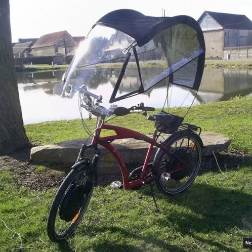 The Veltop is a removable windscreen/canopy/side window system, for protecting cyclists from rain and cold winds