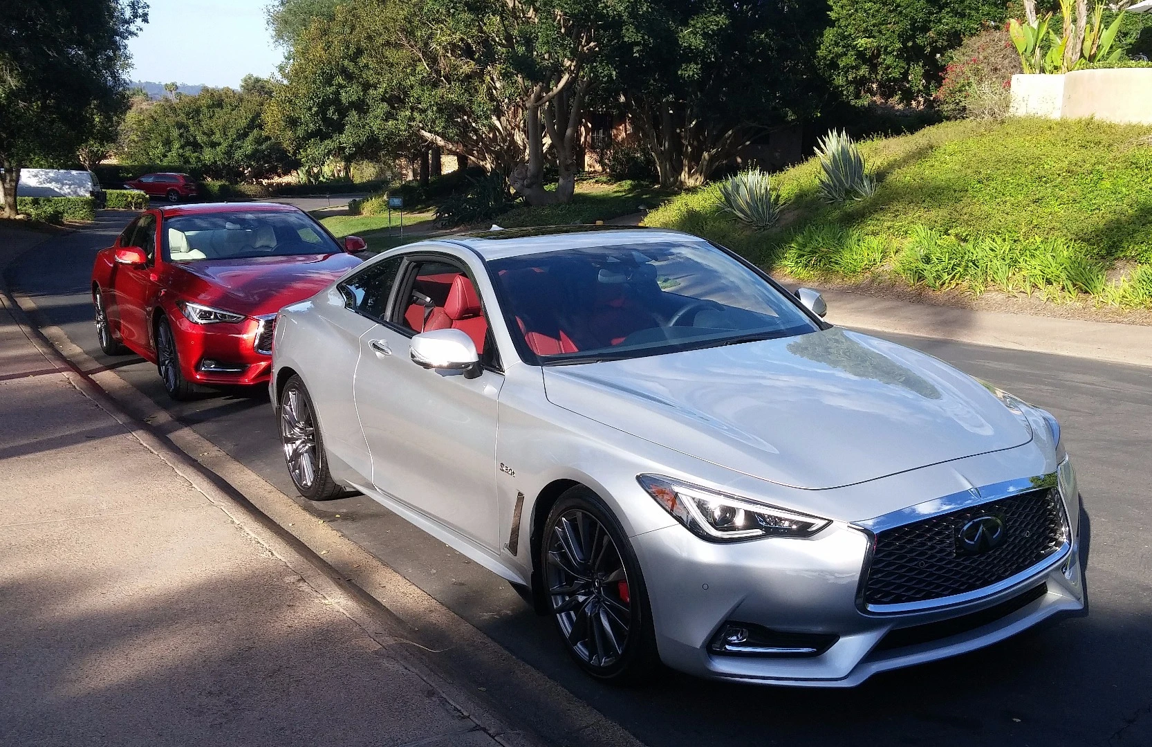 Our first drive for the day was the 2017 Infiniti Q60 in Liquid Platinum (foreground)