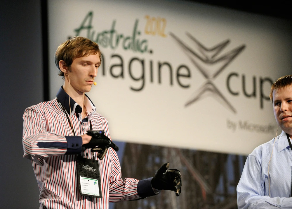 quadSquad team members Stepanov Anton and Osika Maxim demonstrate the EnableTalk system at the 2012 Imagine Cup (Photo: Microsoft)