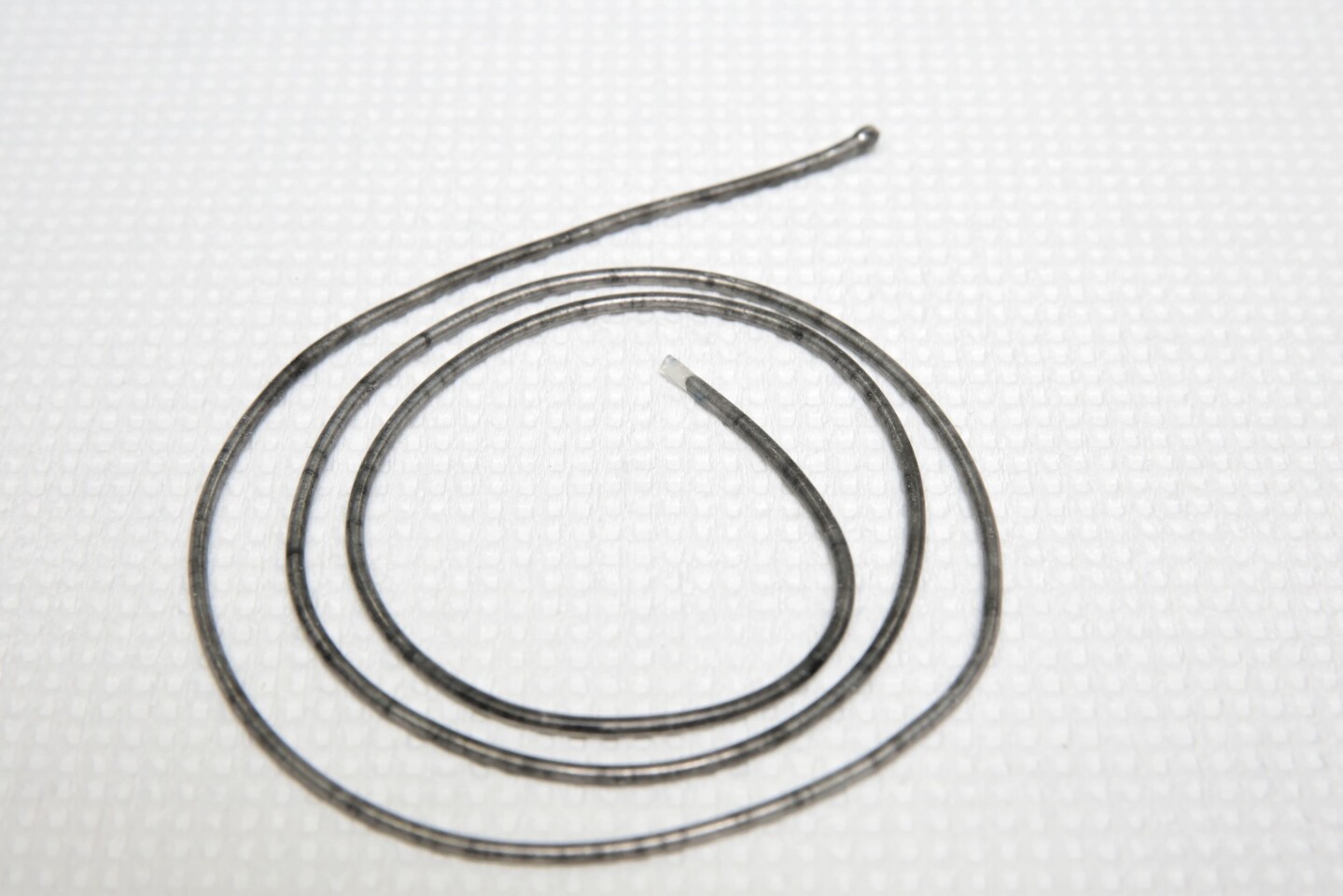 When an electrical current is passed up and down the wire it heats up the alloys inside the tube