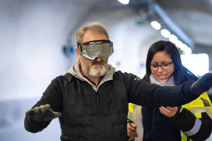 A volunteer tries out the EvacSound system in a tunnel in Trondheim, Norway