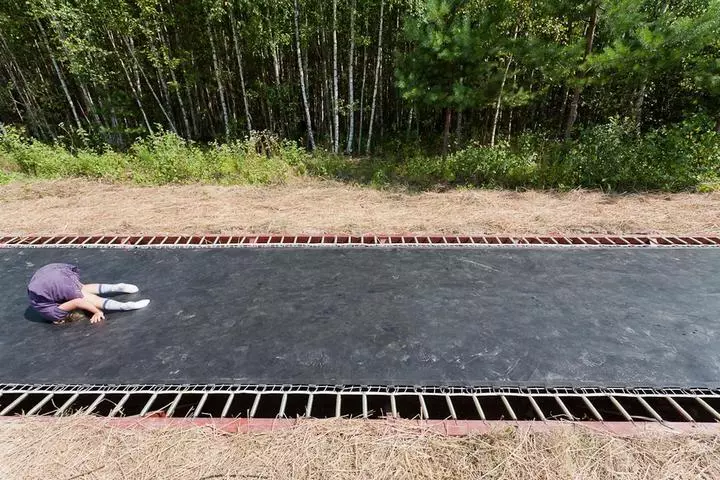 Fast Track invites visitors to playfully bounce along the extended trampoline road
