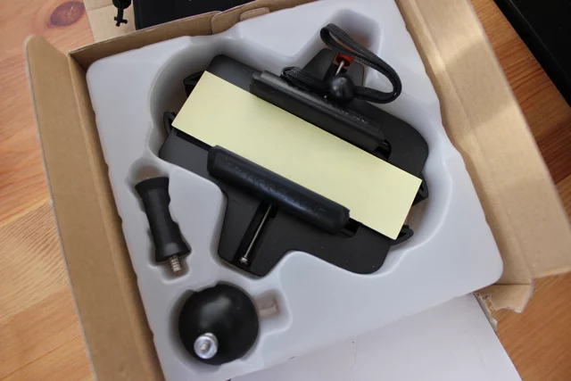 The Snapzoom as it's packaged – the counterweight (lower left) is for use with a spotting scope