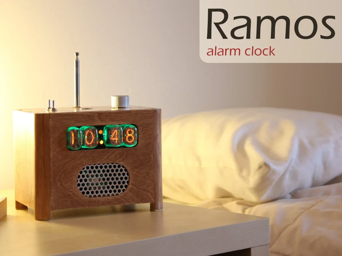 The Nixie Ramos alarm clock features vertically mounted, new-old-stock Soviet Union nixie tubes with green LED backlighting for the clock display