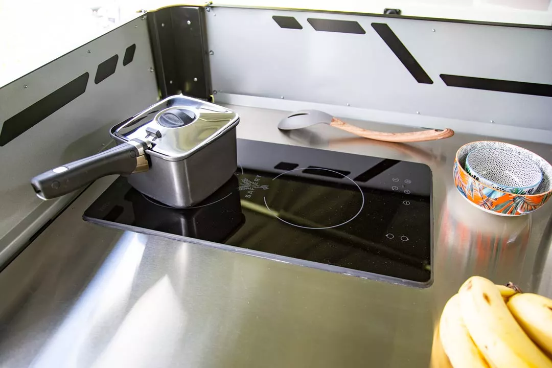The Safiery induction cooktop has touch controls and safety features