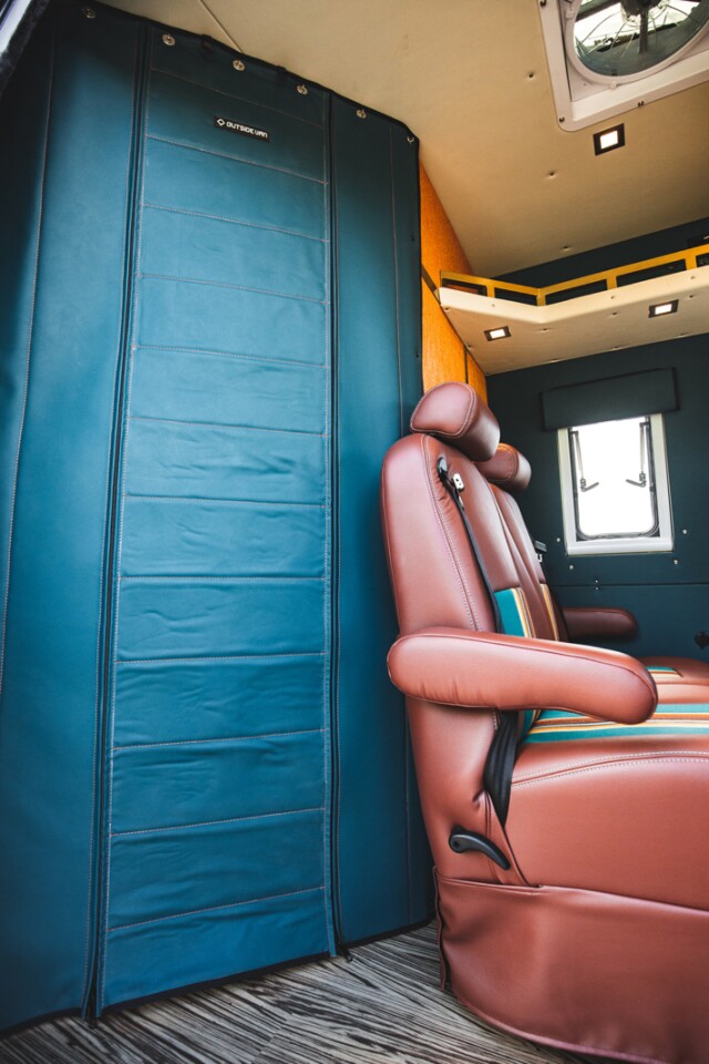 The retractable soft wall splits the Next Gen into driver cab and living areas, helping to keep the living space cooler (or warmer)