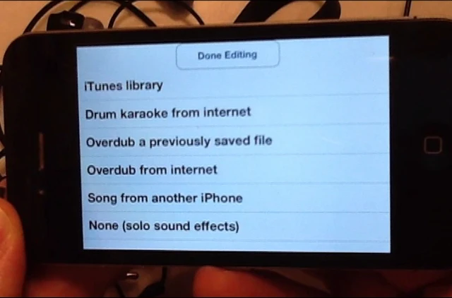 The system communicates with the iPhone over Bluetooth via a companion app
