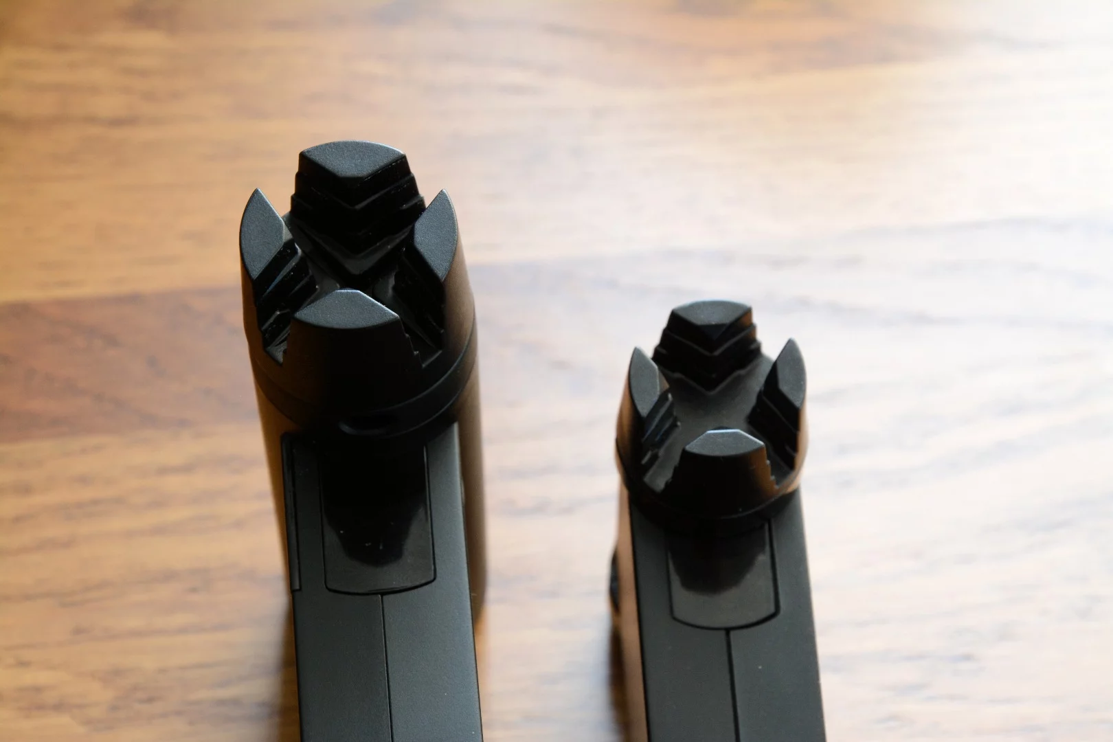 The Roadie Bass (left) has a more powerful motor and a bigger peg turner than the Roadie 2 (right), but runs on the same 500 mAh Li-ion battery